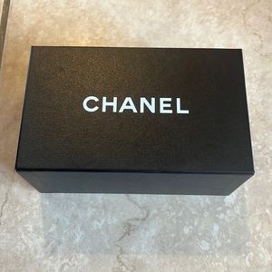 Chanel gift box comes with certification booklet